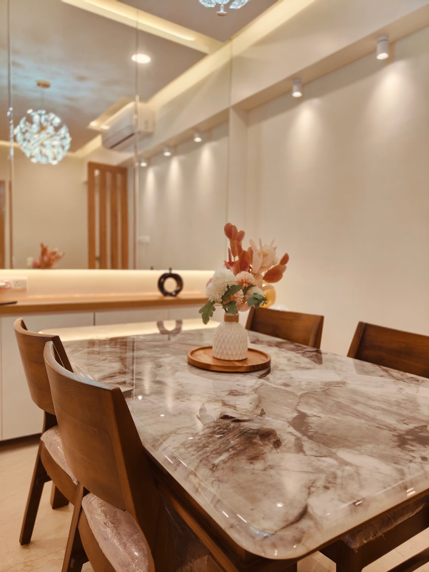 Marble-top dining table detail at Lodha Bella Vita by Viona Interiors
