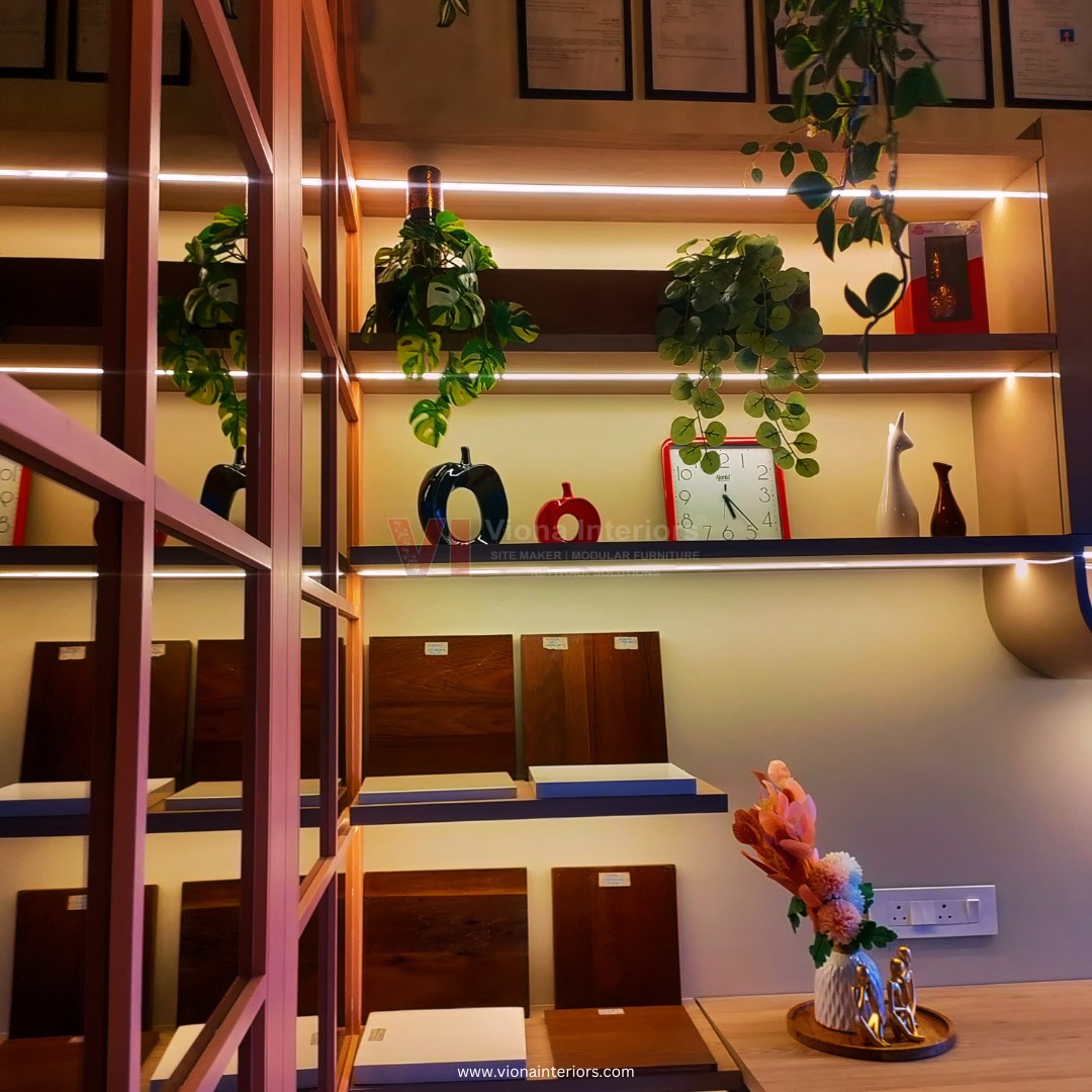 Material and finish sample display with indoor plants at Viona Interiors