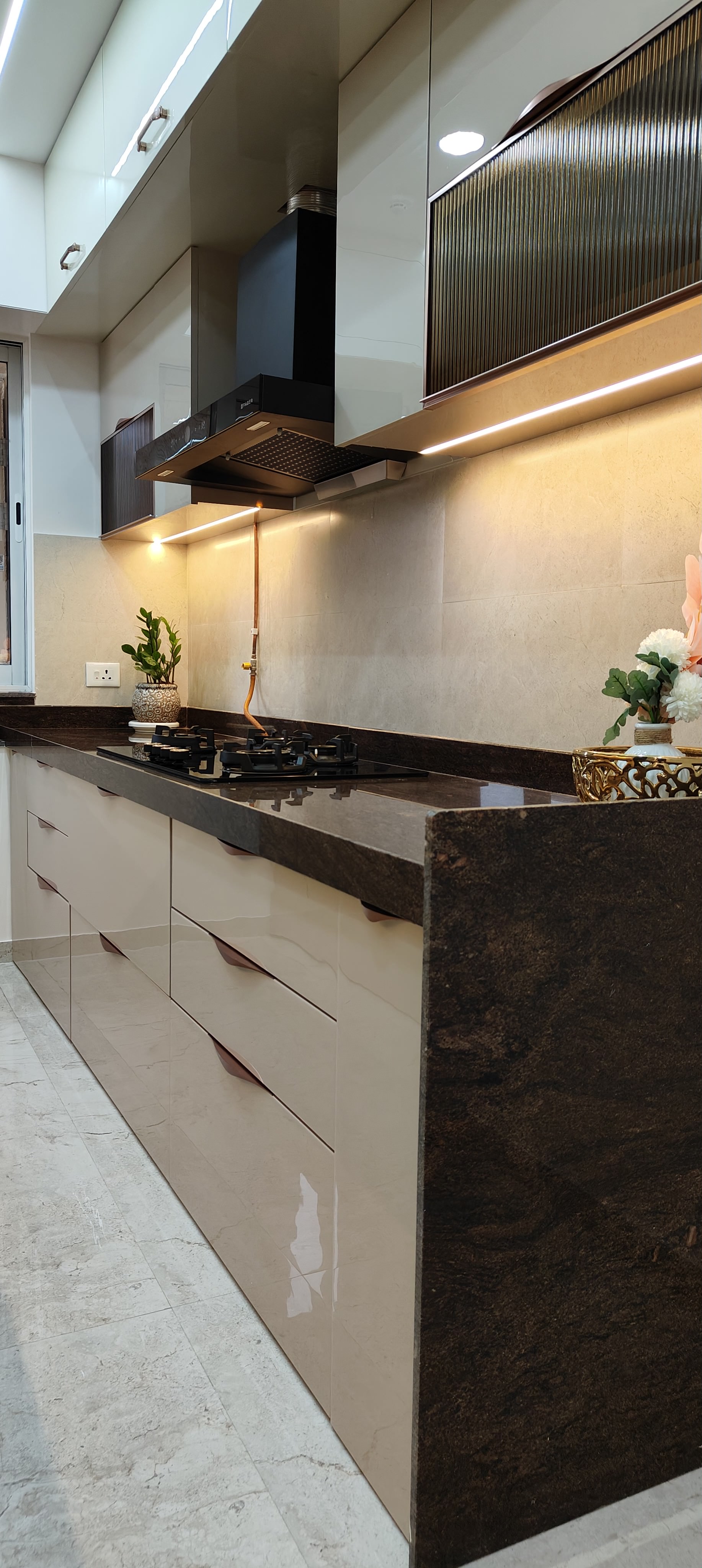 Bathroom interior with premium tiling at Raheja Reserve by Viona Interiors