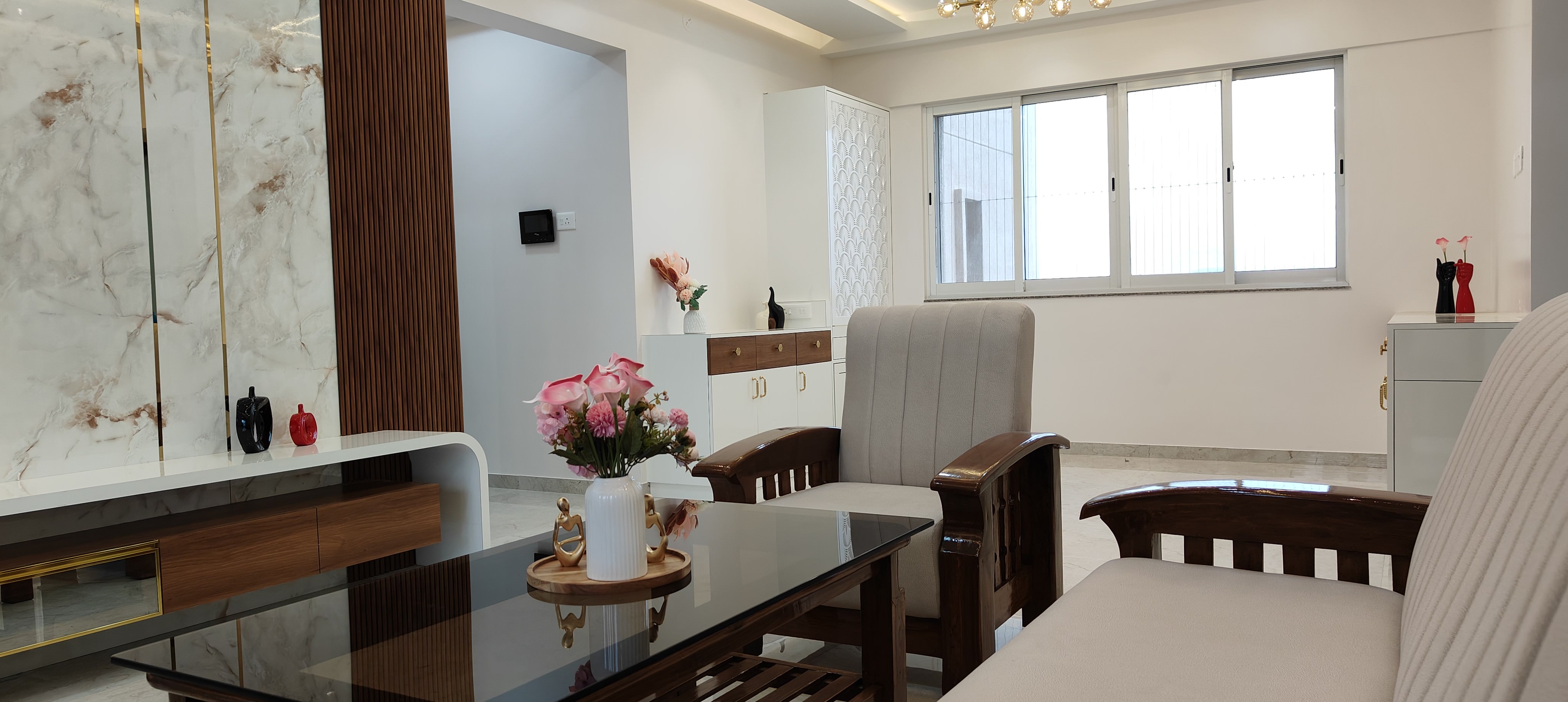Bathroom interior with premium tiling at Raheja Reserve by Viona Interiors