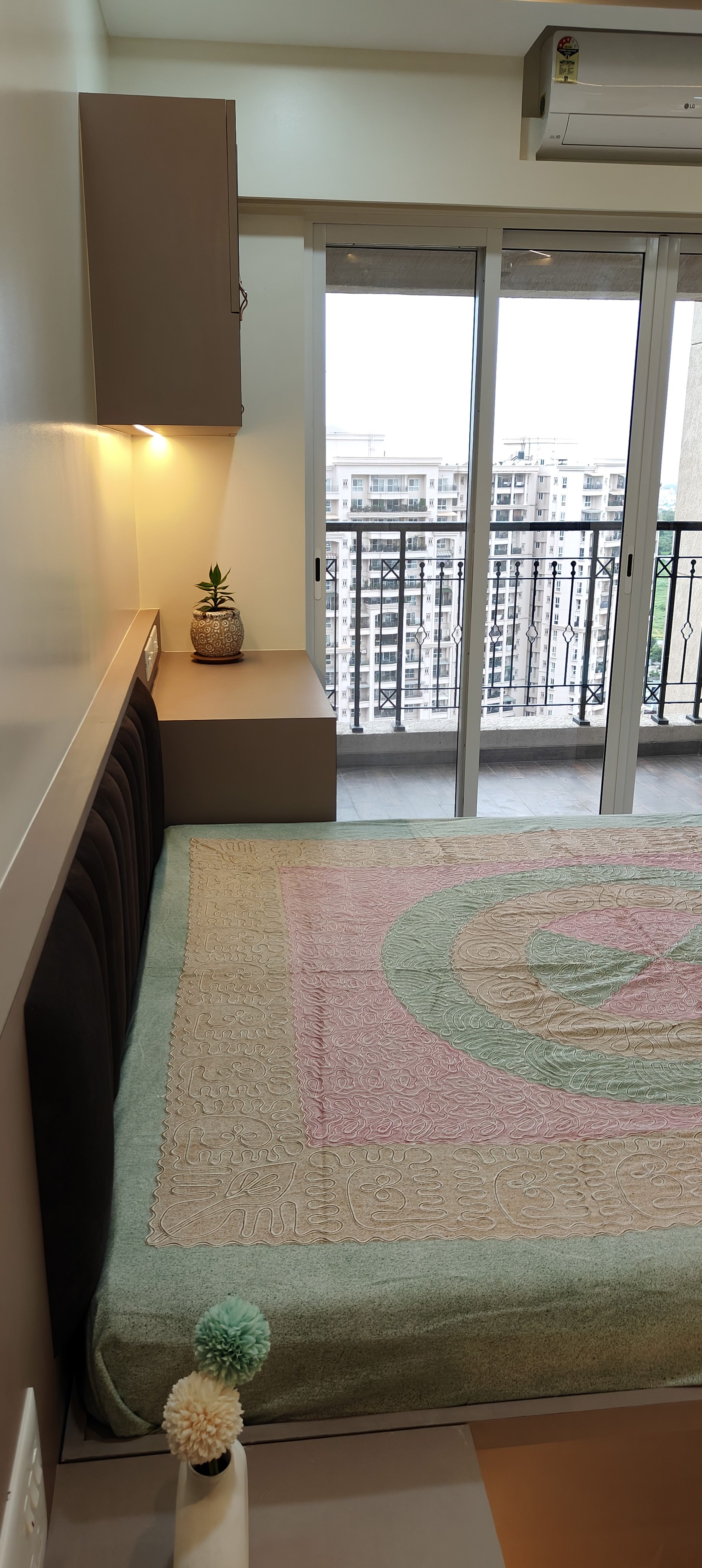 Bathroom interior with premium tiling at Raheja Reserve by Viona Interiors
