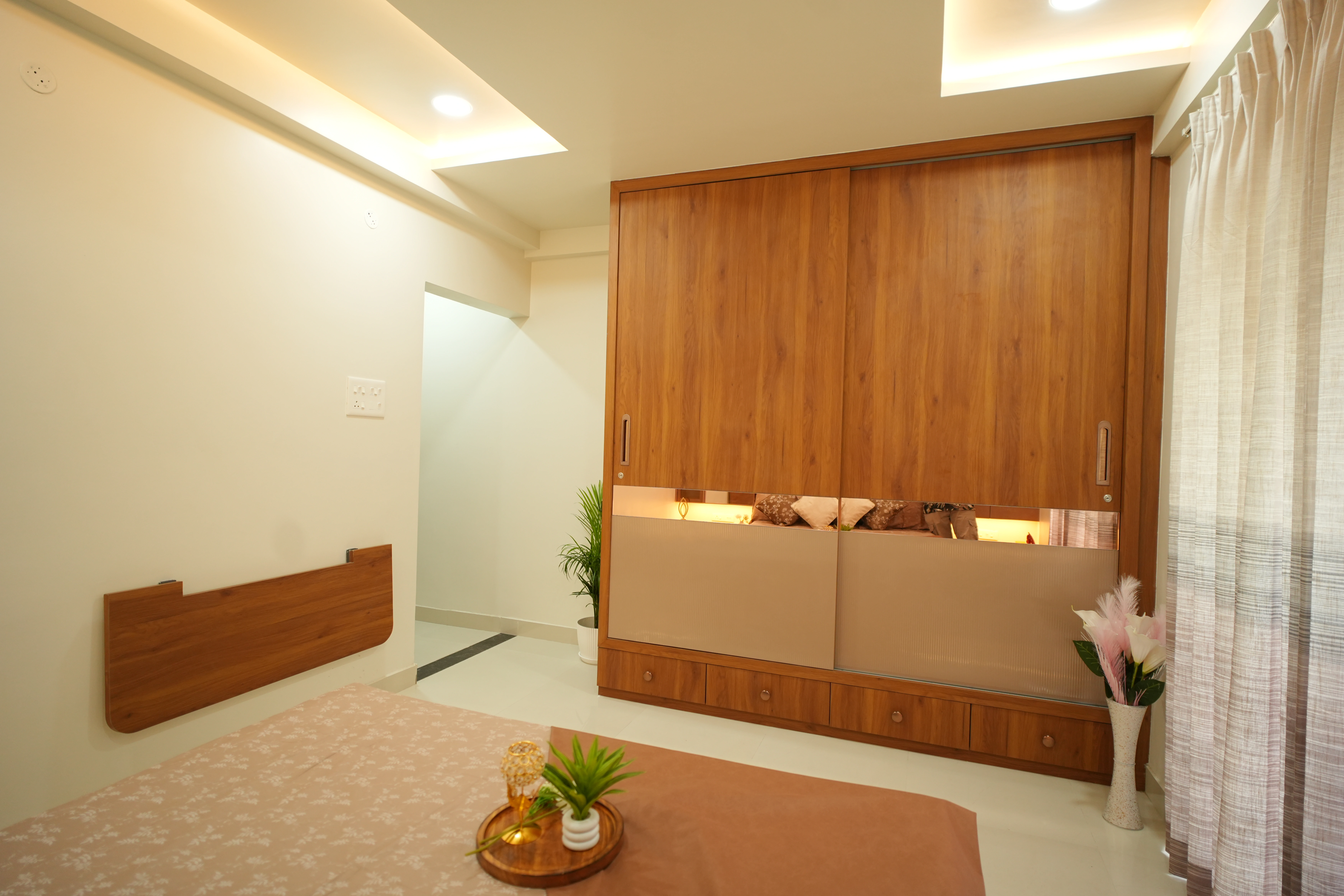 Modular kitchen with premium finishes at Sumathee Enclave by Viona Interiors
